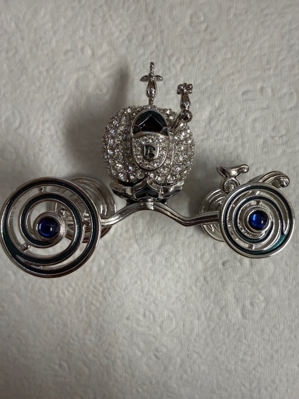 Swarovski Disney Cinderella pumpkin coach broach with spinning wheels.